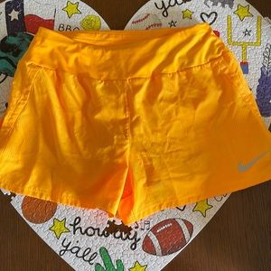 Yellow Nike shorts